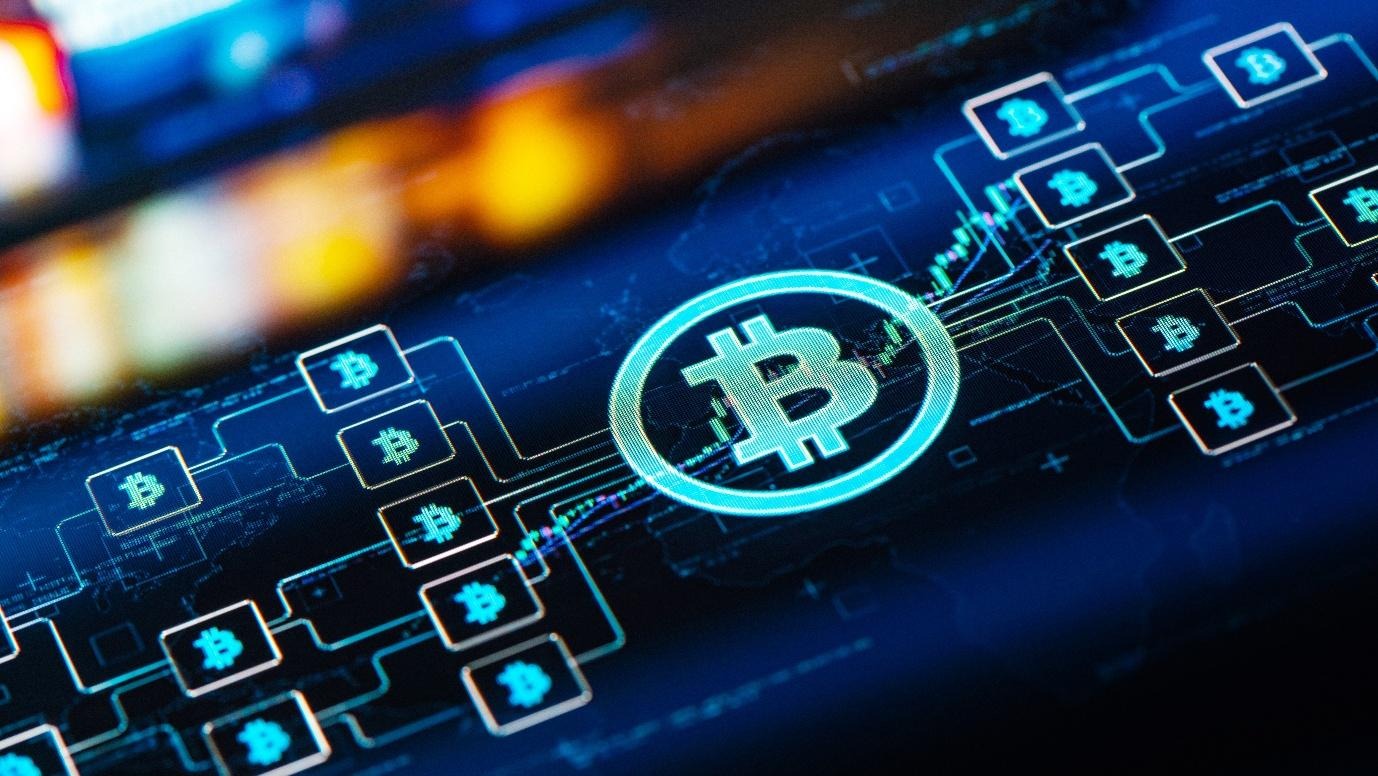 Image of Bitcoin on screen.