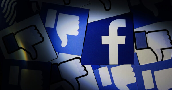 Facebook logo with thumbs down