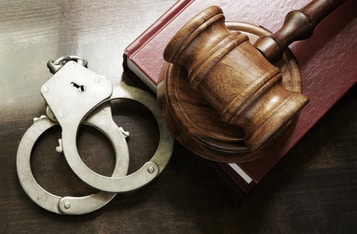 John McAfee to be Served with SEC Court Documents as He Awaits Extradition from Spain