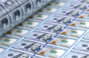 Cardano CEO Getting a OneCoin Vibe from Federal Reserve's 'Infinite Cash' Statement